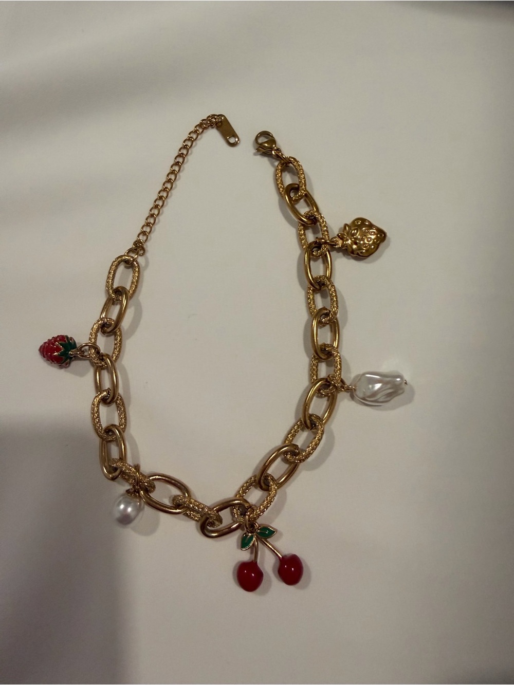 Gold Charm Bracelet with Red and White Accents - Picture 9 of 9